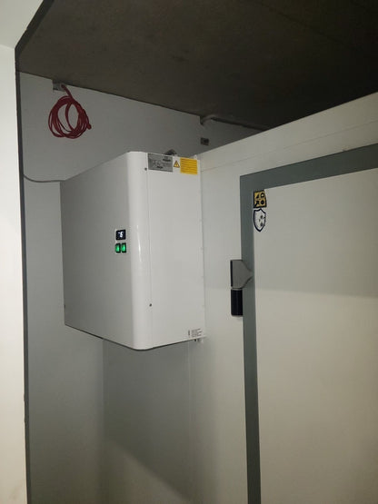 Wall mounted monoblock installed on a cool room wall, exterior